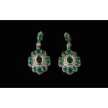 Emerald and Zircon Drop Earrings, each pendant drop having an oval cut emerald, bezel set, initially