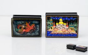 Two Mid - Late 20th Century Russian Lacquered Boxes Each signed in cyrilic script, the largest 2 3/4