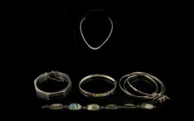 A Mixed Collection Of Silver Jewellery A varied lot to include contemporary rainbow set crystal