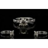 18ct White Gold Superb Quality Single Stone Diamond Ring - with diamond shoulders. The single