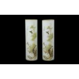 A Pair Of Oriental Glass Spill Vases Each of cylindrical form in opaque glass with printed bamboo