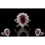 18ct White Gold Superb Pear Shaped Ruby And Diamond Cluster Ring Of stunning quality,