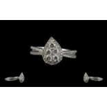 Ladies 9ct White Gold Attractive Pear Shaped Diamond Cluster Ring - of pleasing design.