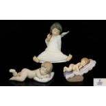 A Collection of Lladro and Nao Porcelain Figures ( 3 ) All 1st Quality and Mint Condition.
