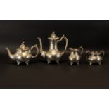 A Four Piece Anglo Indian Style Plated Metal Tea And Coffee Service Comprising footed teapot,