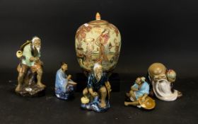 A Collection Of Oriental Ceramics And Figures To include 20th century Satsuma style lidded ginger