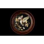A Large Oriental Wall Plaque With Applied Relief Decoration Circular charger with painted blossom