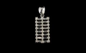 9ct White Gold And Diamond Set Pendant Rectangular panel set with round brilliant and baguette