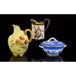 Royal Worcester Jug Hand painted floral design on blush ground with gilt moulded handle and poppy