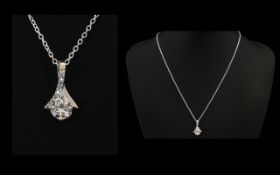 A Stunning And Contemporary Sterling Silver And Faceted CZ Set Pendant Necklace Comprising Fine