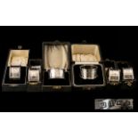 A Collection Of Boxed Silver Napkin Rings Comprising six single boxed napkin rings hallmarks to