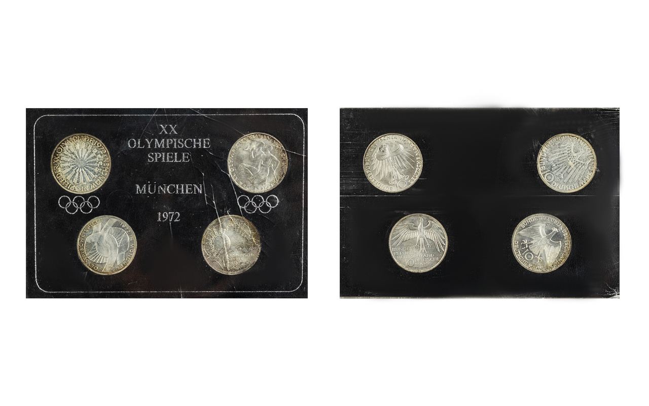 XX Olympic Games Munich 1972 - set of four silver coins in mint condition. Still in original wallet.
