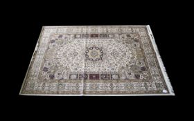 A Very Large Woven Silk Carpet Keshan rug with beige ground and traditional Middle Eastern floral