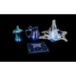 A Collection of Blue Glass Decorative Items. Includes a small blue glass jug, small blue vase,