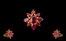 Ruby Flower Shape Ring, the centre oval cut ruby, of 3.