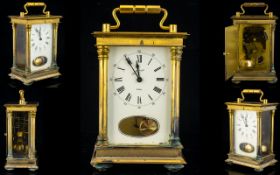 A Brass Cased Carriage Clock Comprising white enamel dial, Roman numerals with outer minutes