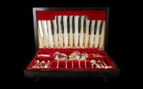 A Canteen Of Cutlery By Insignia Plate Comprising six place settings in velvet lined fitted case.