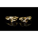 Pair Of 9ct Gold Diamond Earrings Interlocking hoop design set with daimonds fully hallmarked.