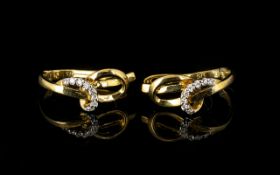 Pair Of 9ct Gold Diamond Earrings Interlocking hoop design set with daimonds fully hallmarked.