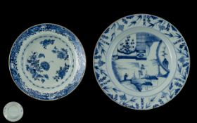 Two 18th Century Chinese Blue And White Dishes One depicting figure on a bridge with foliate border,