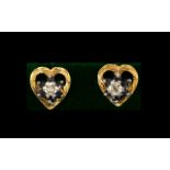 A Pair Of 9ct Gold CZ Set Stud Earrings Open heart form earrings in textured 9ct gold, the centres