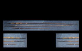 A Collection Of Tribal Spears Comprising two constructed entirely of wood,