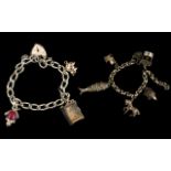 Two Silver Bracelets Loaded with 8 Silver Old Charms.