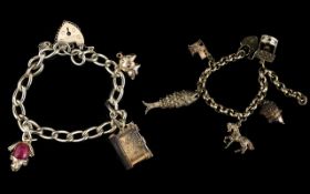 Two Silver Bracelets Loaded with 8 Silver Old Charms.