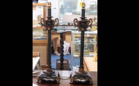 A Pair Of Reproduction Table Lamp Bases raised on square footed base with reeded column.