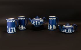 Wedgwood 19th Century Collection of Jasper Ware Teapots (2) and Jugs (3). Five items in total.