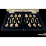 George V Deluxe Boxed Silver Set of 12 Teaspoons and Matching Sugar Nips.