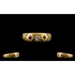 Victorian Period Attractive 18ct Gold Diamond and Ruby Dress Ring - the central diamond flanked by