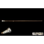 Antique Walking Cane With Silver Top Hallmarks rubbed, length 29 inches.