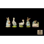 Royal Albert Five Beatrix Potter Figures To include Mrs Flopsy Bunny, Mrs Rabbit Cooking,