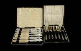 Two Boxed Sets Of Plated Cutlery To include a set of seven pastry forks with reeded handle detail