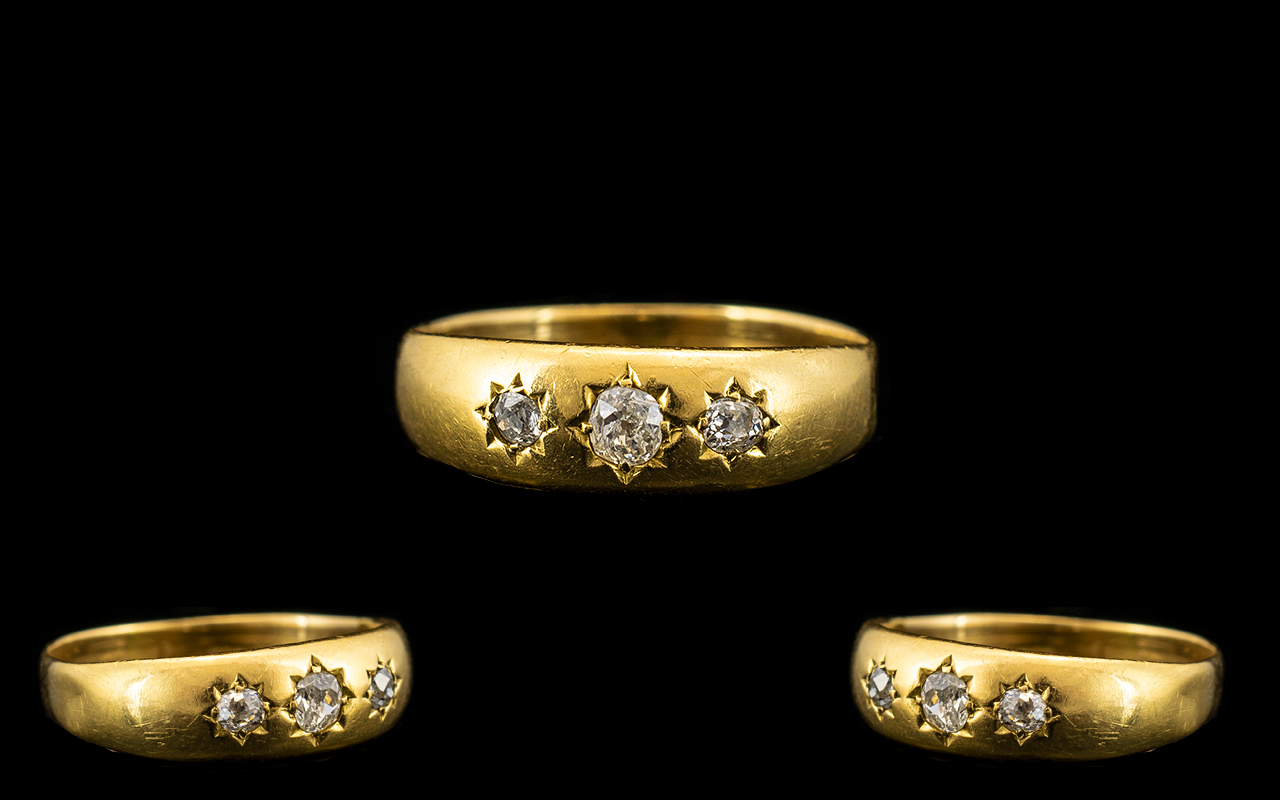 18ct Gold Attractive 3 Stone Diamond Ring - the cushion cut diamond of good colour / clarity.