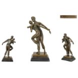 A Cast Bronze Figure Group After Chiparus's Persian Dancers Raised on stepped marble base,