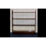 Mahogany Shelf Unit Rack - comprising three shelves above x 2 frieze drawers with open work sides.