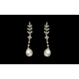 Pair Of 9ct Pearl And Diamond Earrings Drop earrings with milgrain diamond set leaves,