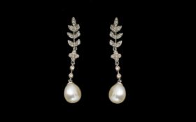 Pair Of 9ct Pearl And Diamond Earrings Drop earrings with milgrain diamond set leaves,