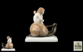 Rosenthal - Stunning Porcelain Figure of a ' Fairy Girl ' Riding a Snail.