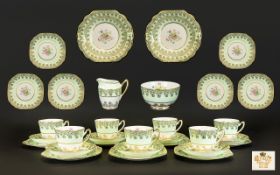 Dakin English Bone China Tea Set To include seven cups and saucers, side plates, sugar and milk.