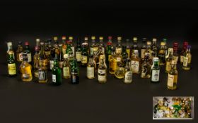 A Large And Varied Collection Of Miniature Whisky All capsules intact,