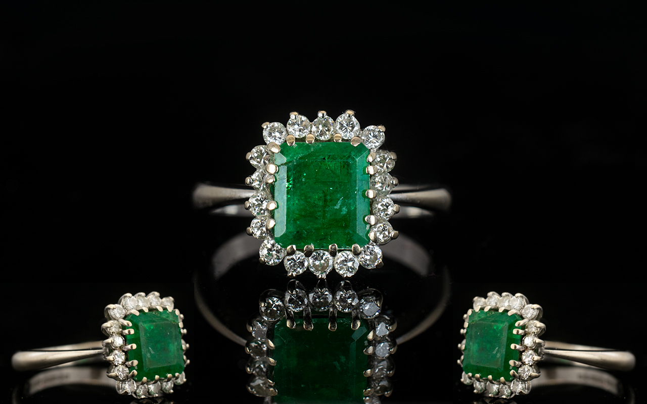 18ct White Gold Attractive Emerald And Diamond Cluster Ring Fully hallmarked,