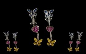 Pair Of 9ct Diamond Sapphire And Ruby Earrings Drop earrings with a ruby heart set between blue and
