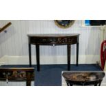 A Modern Oriental Black Lacquered Demi Lune Table Profusely decorated throughout with traditional