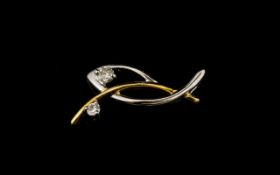 9ct Gold And Diamond Two Tone Pendant Set with two round modern brilliant cut diamonds,