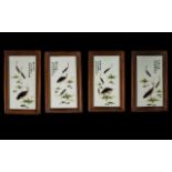 Set Of Four Oriental Wall Plaques Painted tiles, each framed,