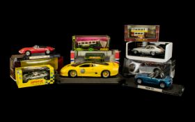 A Collection of Boxed Model Cars (9) in