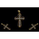 A 9ct Gold Diamond And Diamond Set Cross